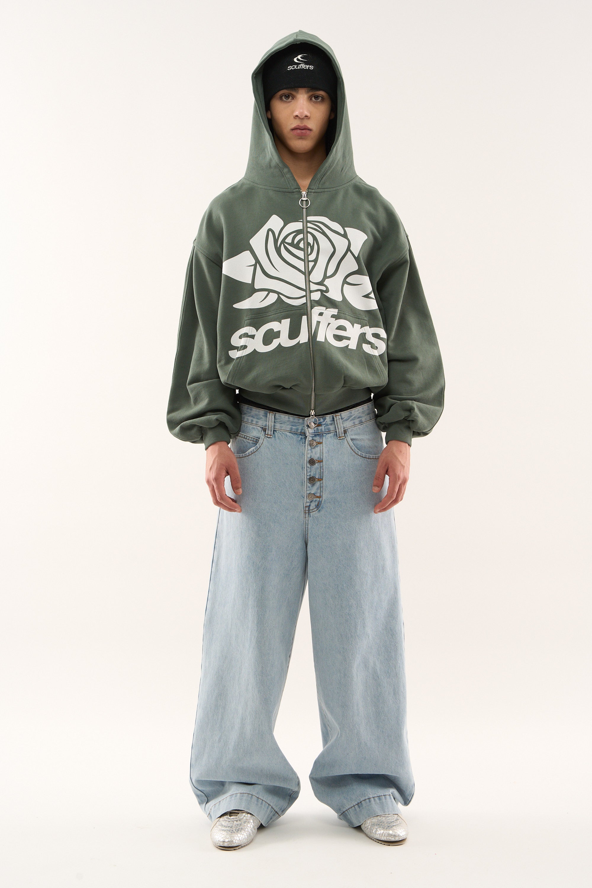 Dziewczęcy zielony zamek błyskawiczny